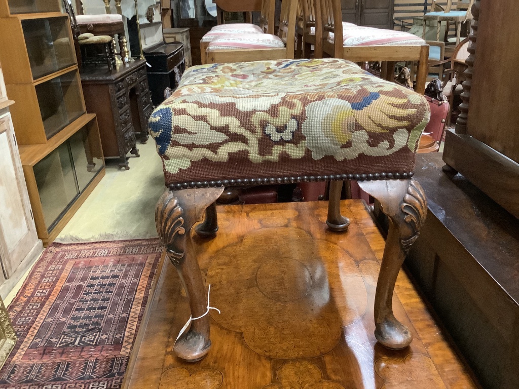 A Queen Anne style carved walnut stool